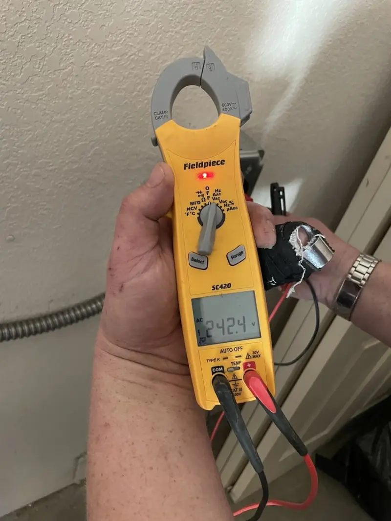 Voltage testing with clamp meter during Electrical Installation Services in South Pasadena